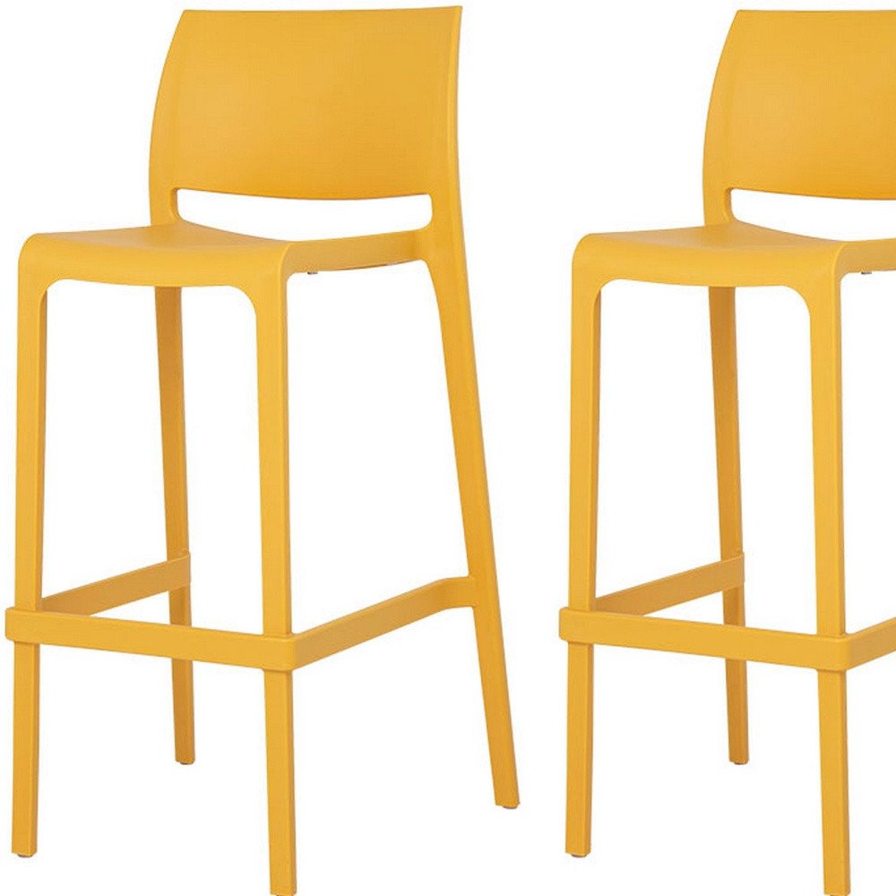 Set of Two 30" Yellow Heavy Duty Plastic Low Back Outdoor Bar Height Chairs on a white background