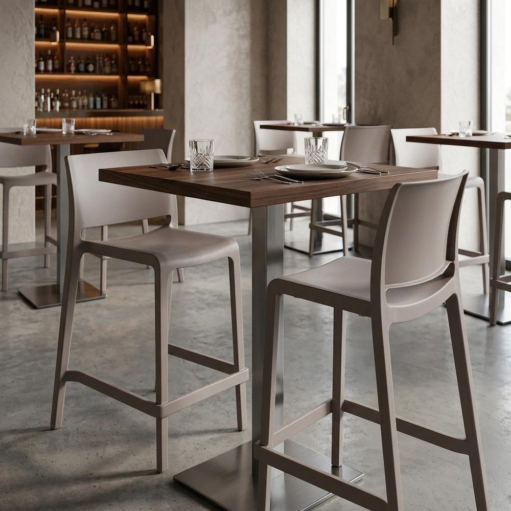 Set of Two 26" Taupe Heavy Duty Plastic Low Back Outdoor Counter Height Bar Chairs in a home interior
