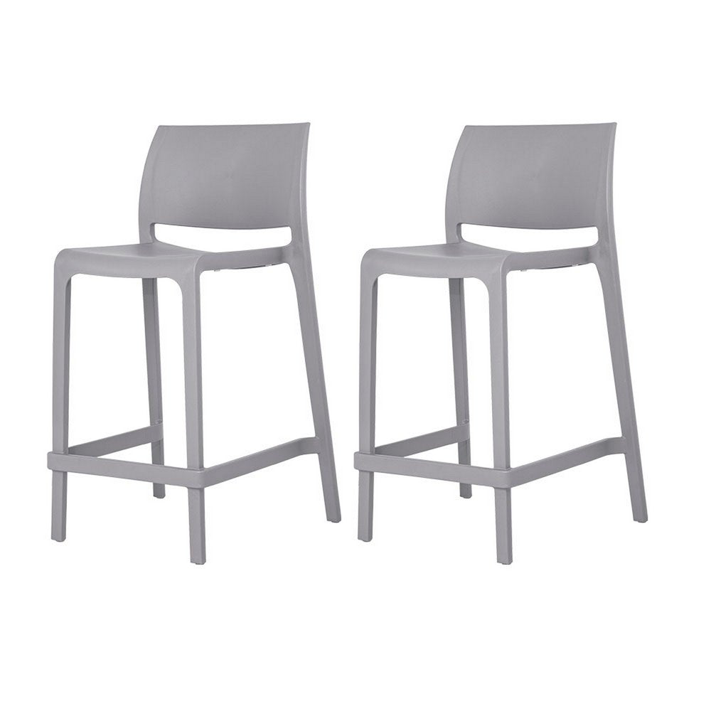 Two gray heavy duty plastic low back outdoor counter height bar chairs on a white background.
