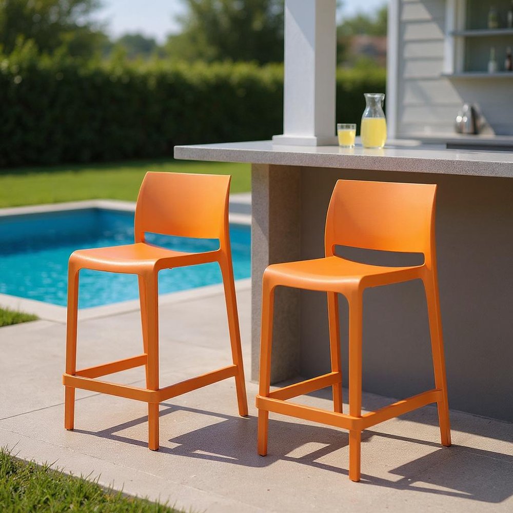 Set of Two 26" Orange Heavy Duty Plastic Low Back Outdoor Counter Height Bar Chairs in a home interior