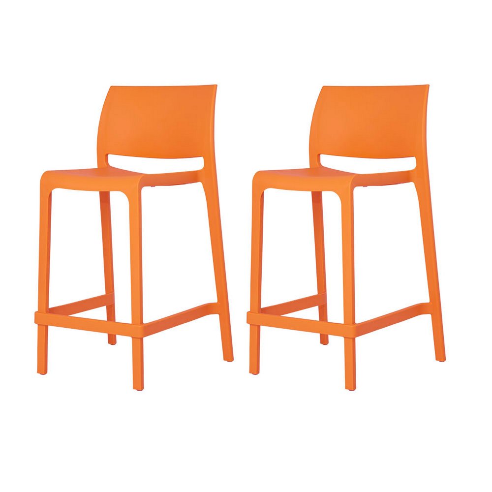 Two orange plastic low back counter height bar chairs with footrests on a white background.