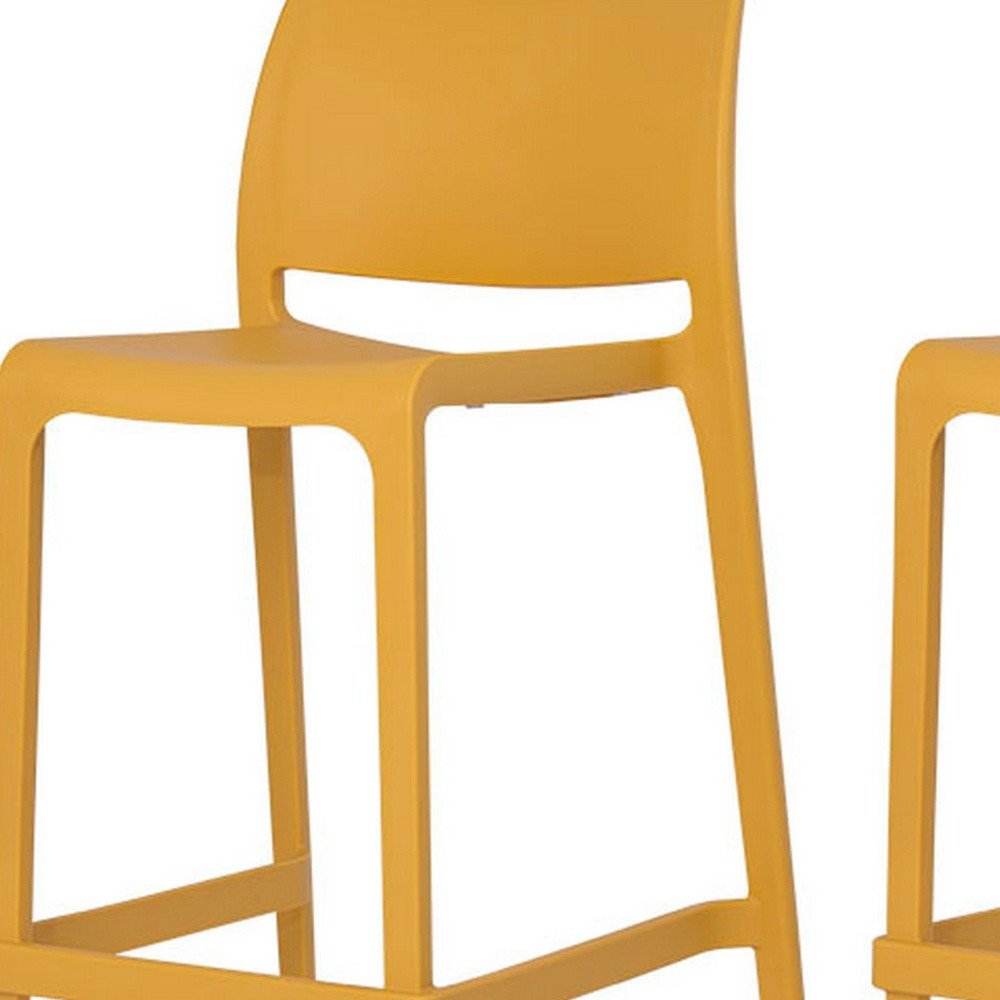 Set of Two 26" Gold and Yellow Heavy Duty Plastic Low Back Outdoor Counter Height Bar Chairs on a white background
