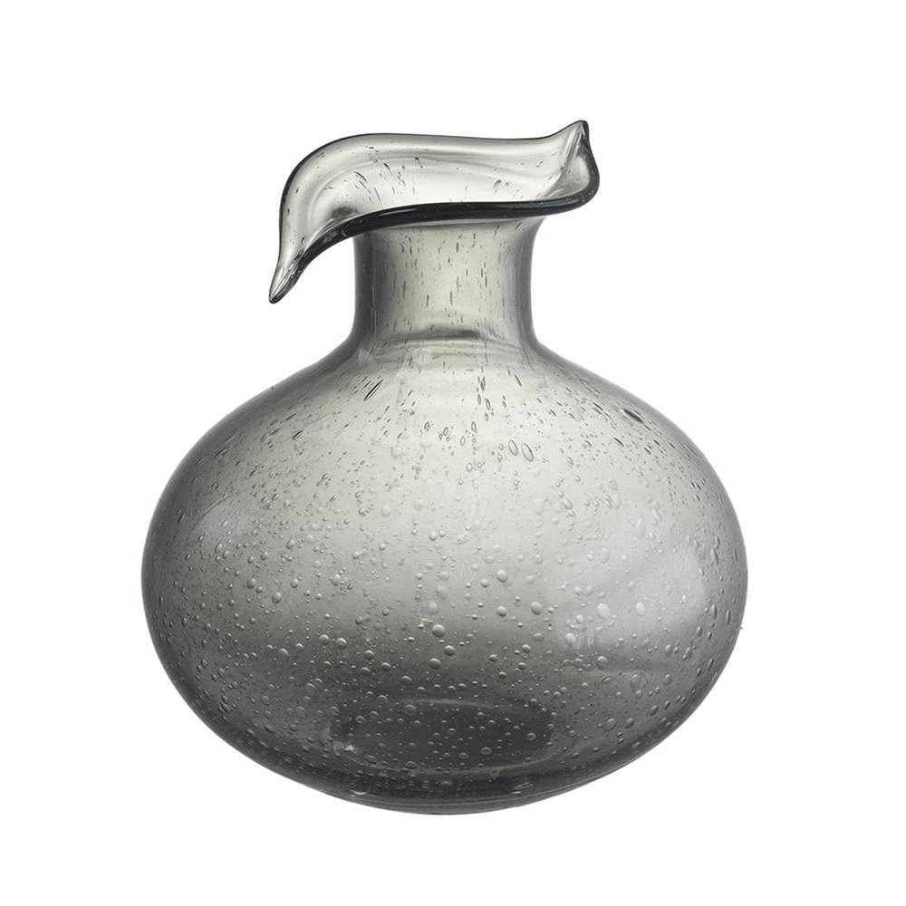 A round, light gray glass vase with bubble inclusions and a unique spout, set against a white background.