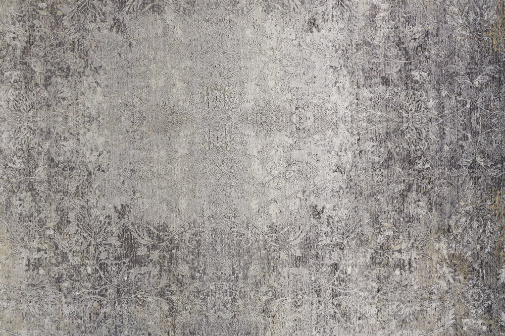9' X 13' Tan and Gray Oriental Power Loom Worn Faded Area Rug close-up detail