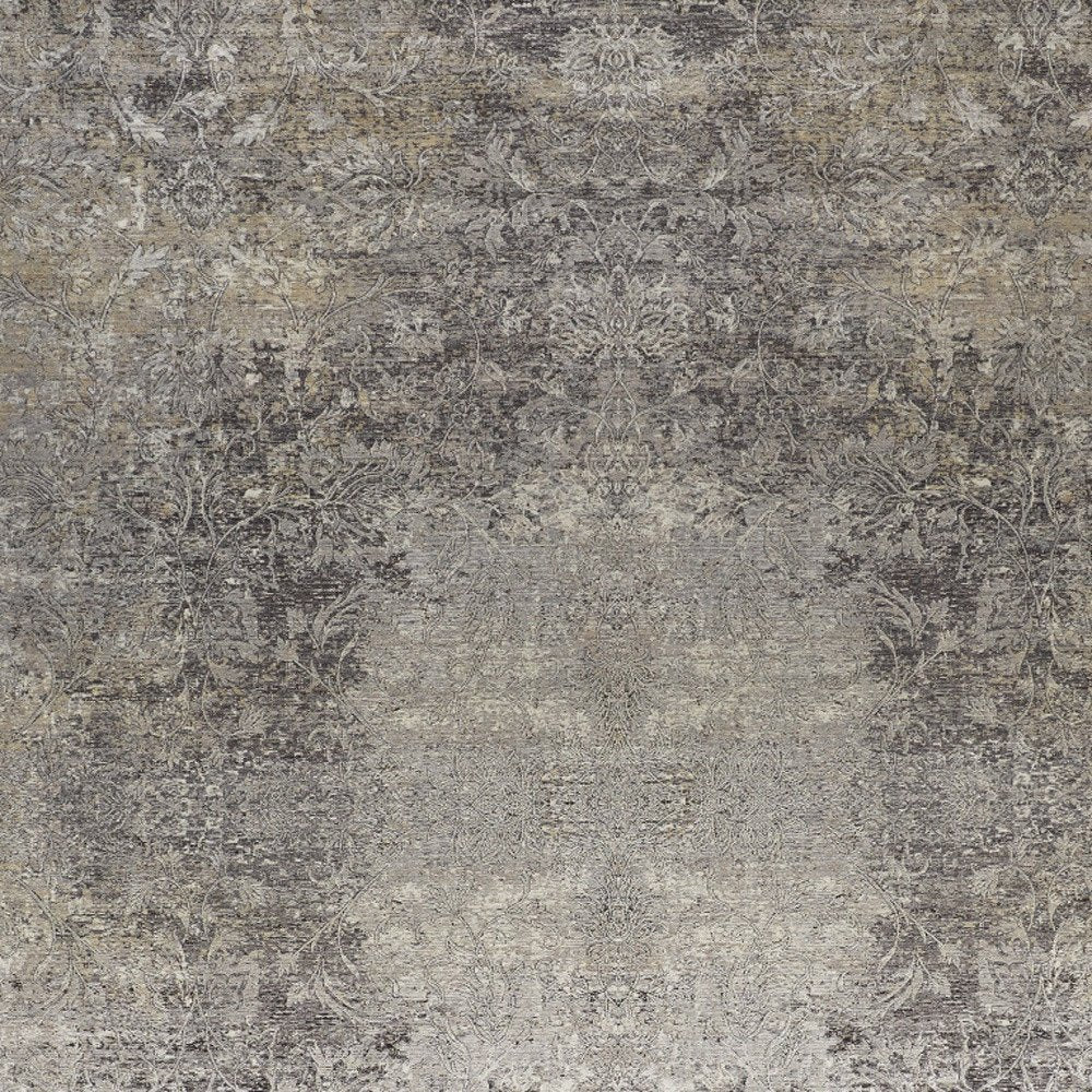 9' X 13' Tan and Gray Oriental Power Loom Worn Faded Area Rug close-up detail