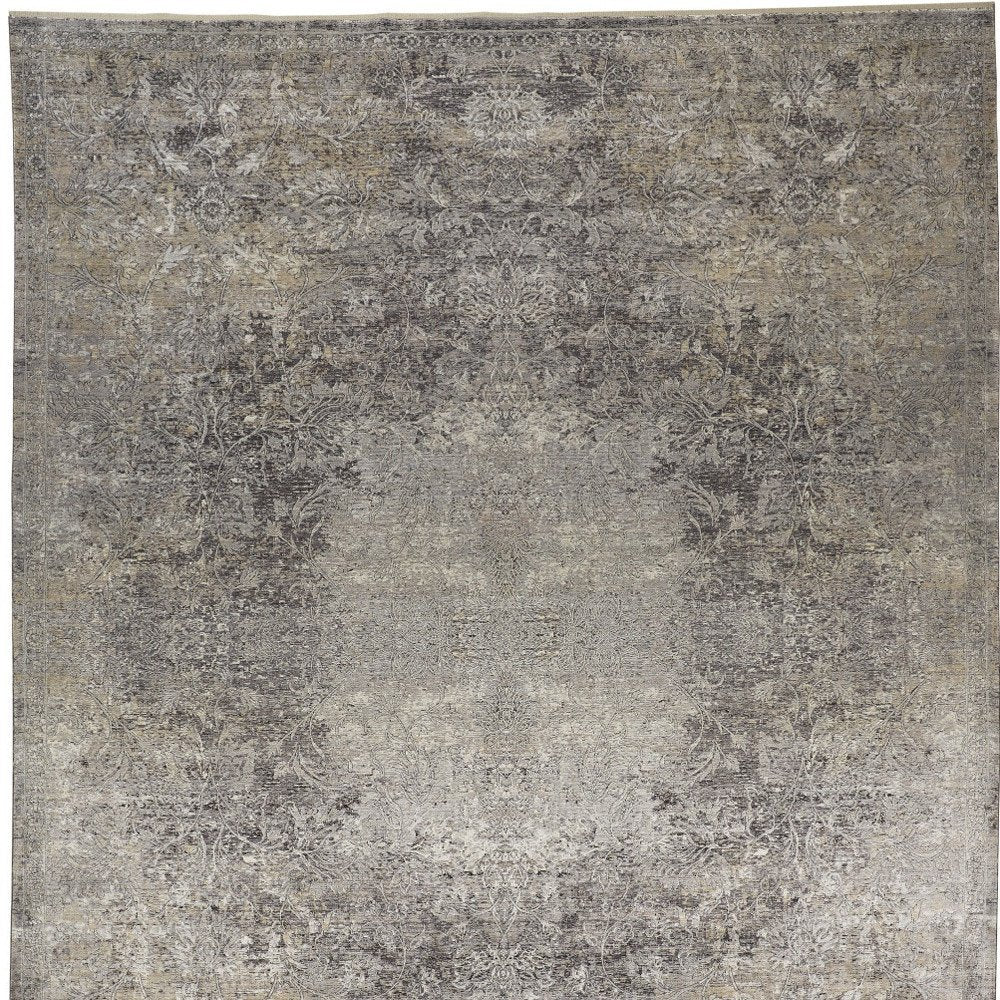 9' X 13' Tan and Gray Oriental Power Loom Worn Faded Area Rug close-up detail