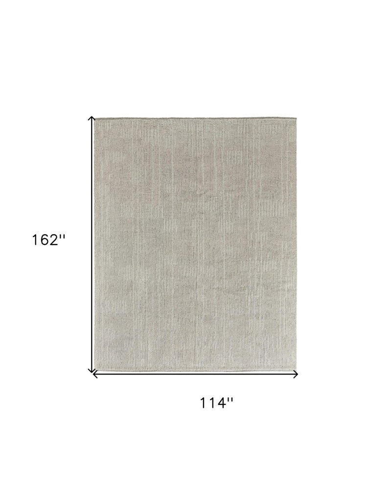 9' X 13' Tan and Ivory Wool Hand Knotted Area Rug on a white background
