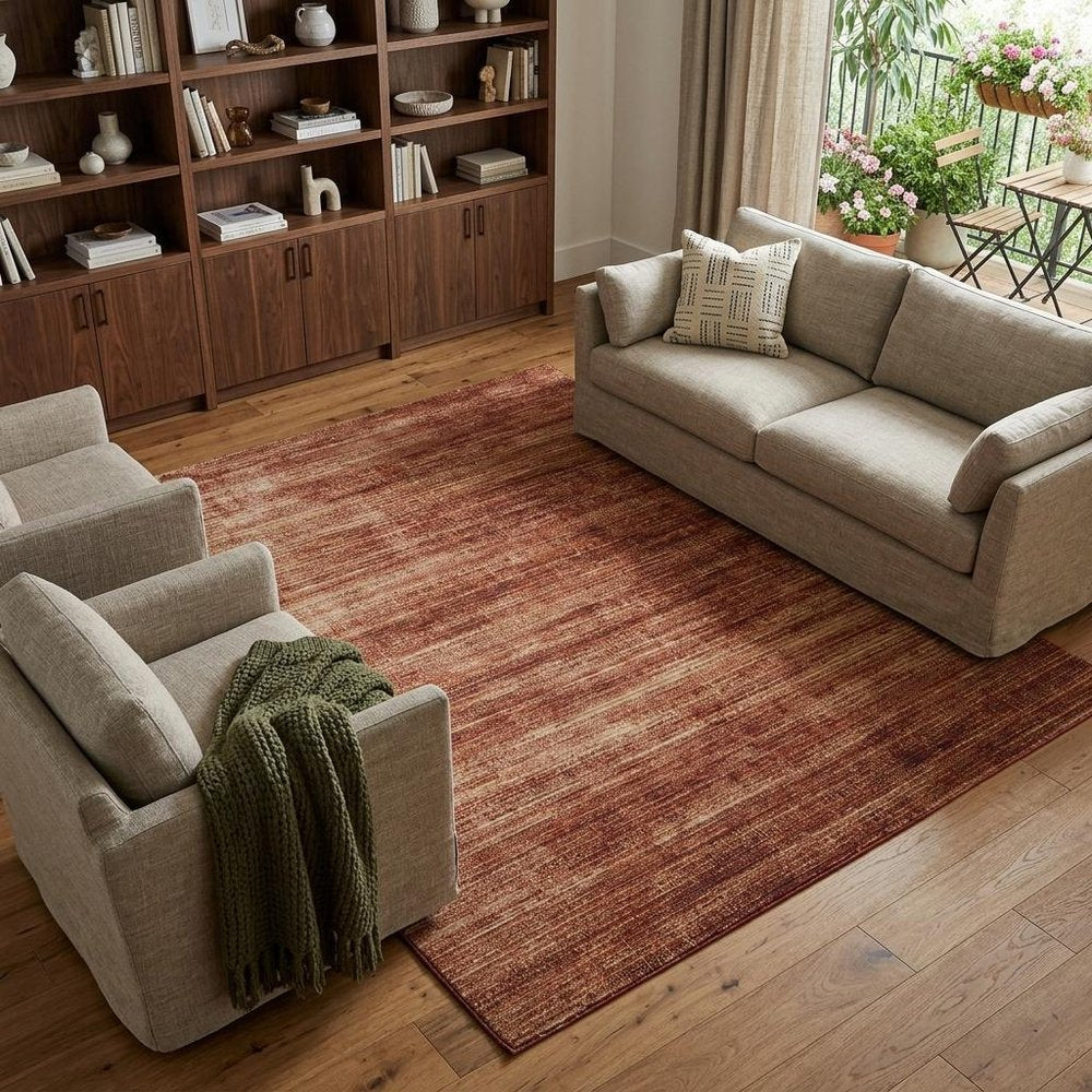 9' X 13' Tan and Brown Power Loom Area Rug in a home interior