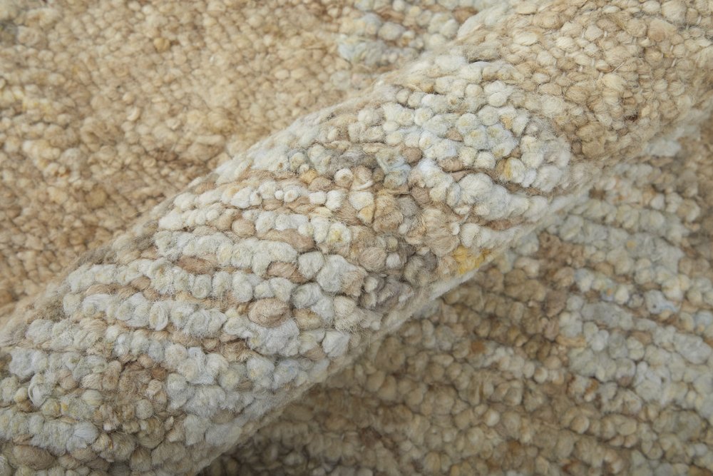 9' X 13' Tan and Ivory Wool Floral Hand Knotted Area Rug close-up detail