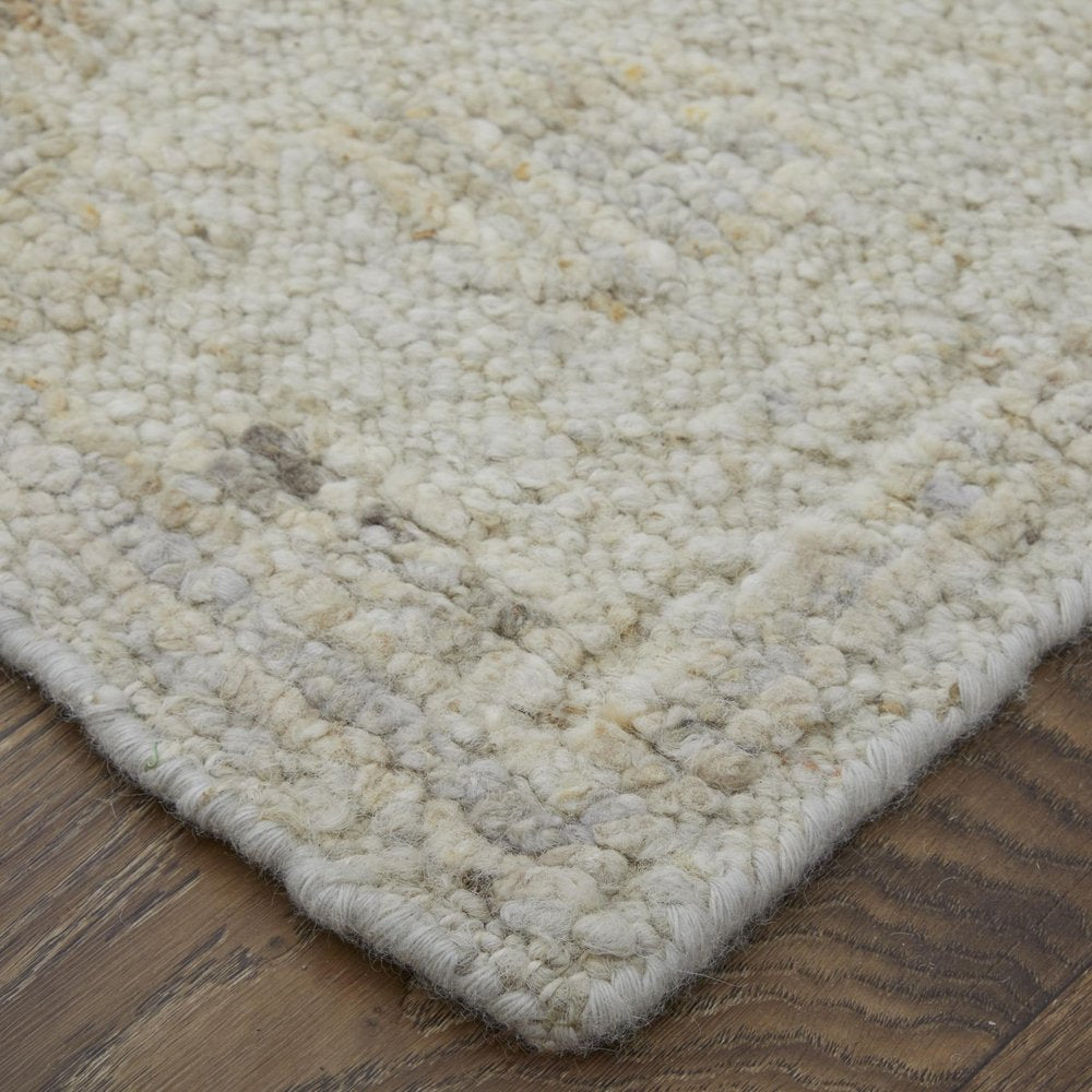 9' X 13' Tan and Gray Wool Floral Hand Knotted Area Rug in a home interior