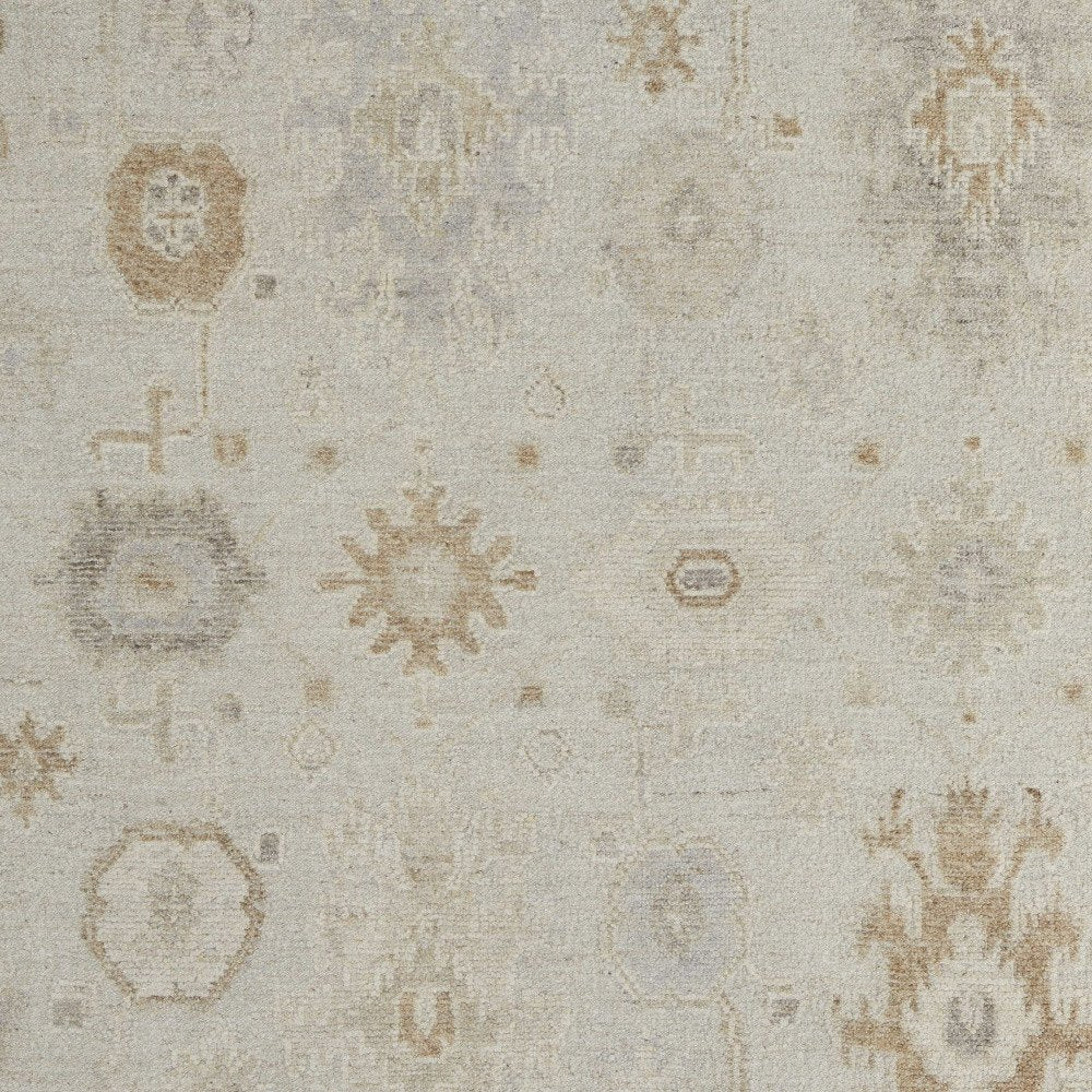 9' X 13' Tan and Gray Wool Floral Hand Knotted Area Rug on a white background