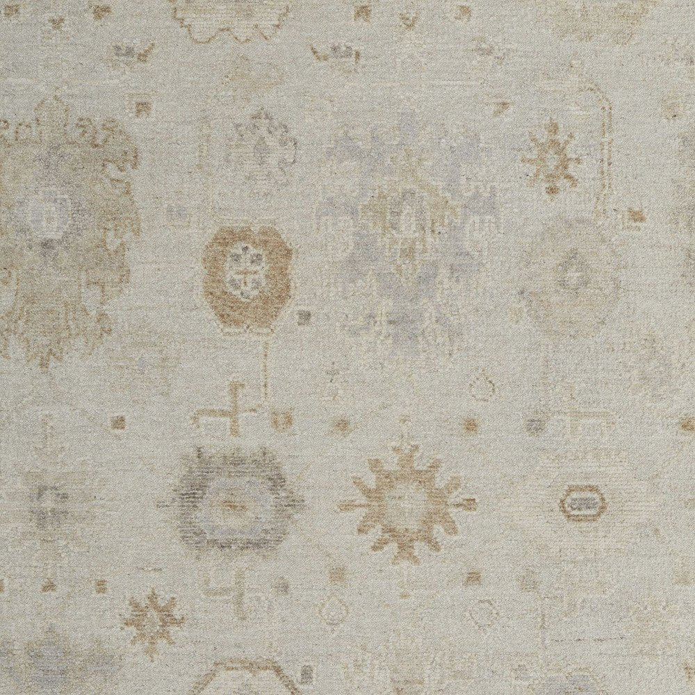 9' X 13' Tan and Gray Wool Floral Hand Knotted Area Rug on a white background
