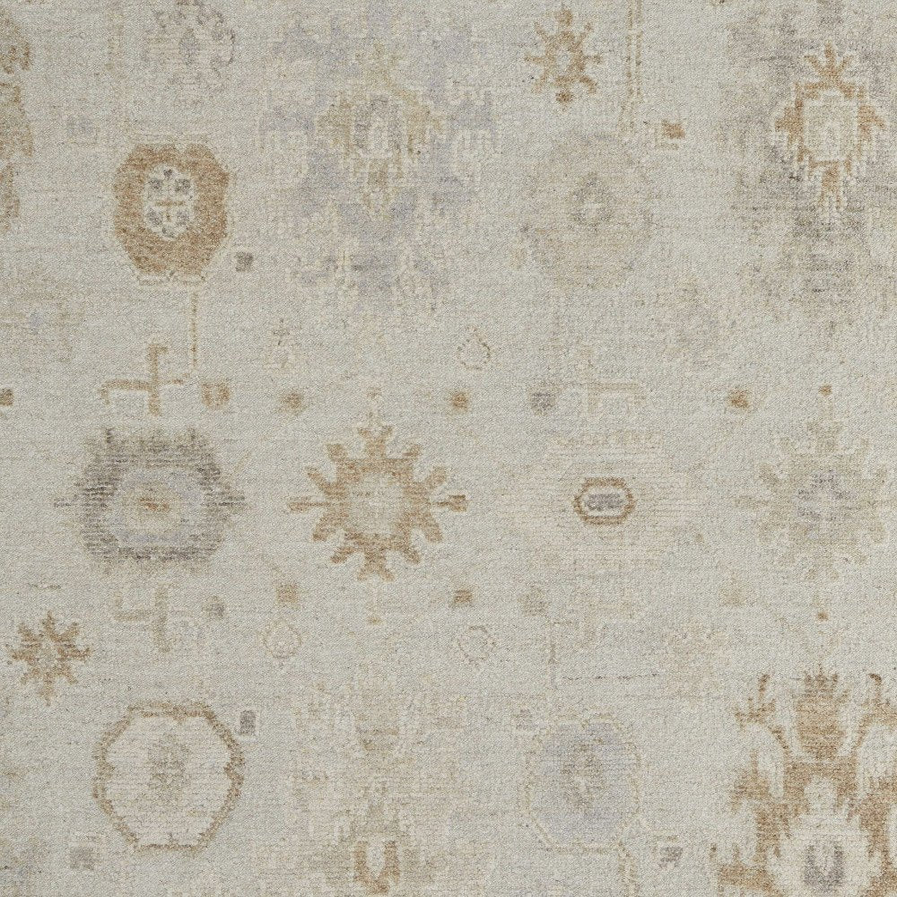 9' X 13' Tan and Gray Wool Floral Hand Knotted Area Rug on a white background