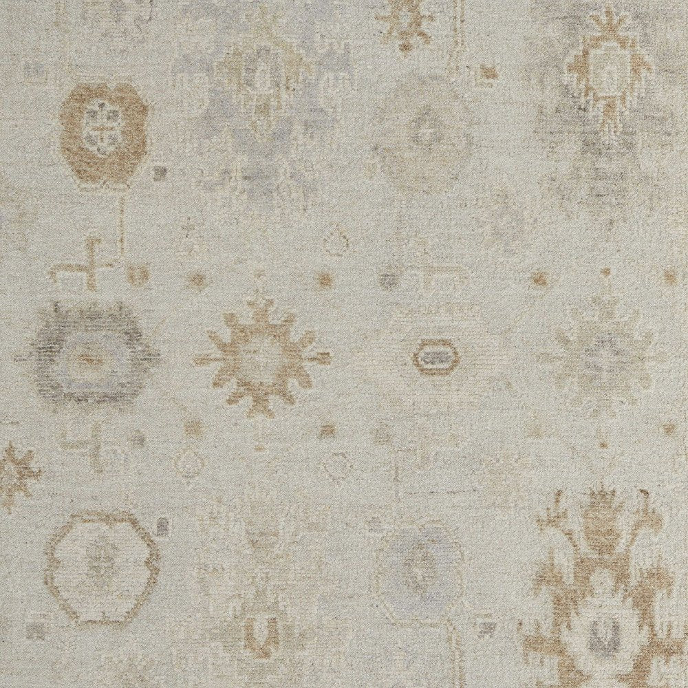9' X 13' Tan and Gray Wool Floral Hand Knotted Area Rug on a white background