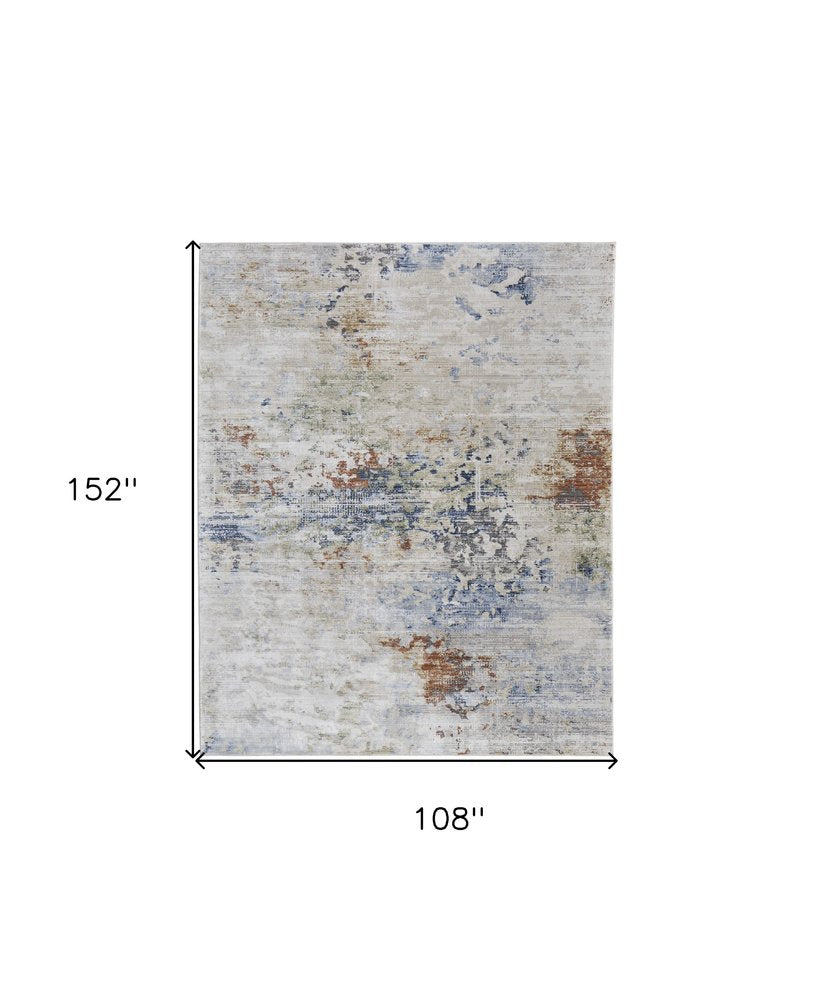 9' X 13' Red Blue and Ivory Abstract Power Loom Area Rug on a white background