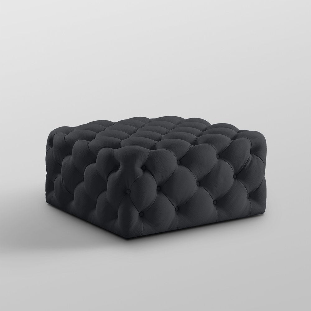 33" Navy Blue Velvet Rolling Tufted Cocktail Ottoman. Ottoman isolated on a plain white background, finished in navy velvet.
