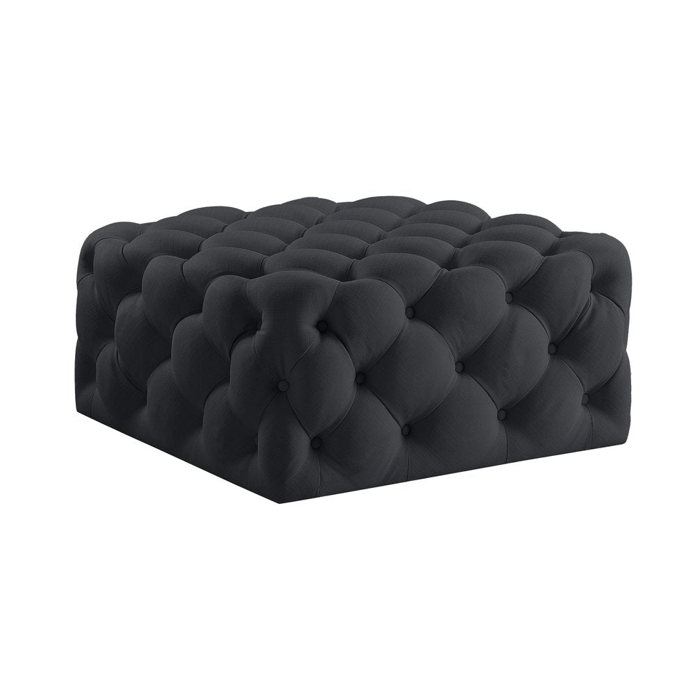 33" Navy Blue Velvet Rolling Tufted Cocktail Ottoman. Ottoman isolated on a plain white background, showing a navy velvet surface.