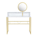 White and gold faux marble vanity table with a round mirror and steel frame on a white background.