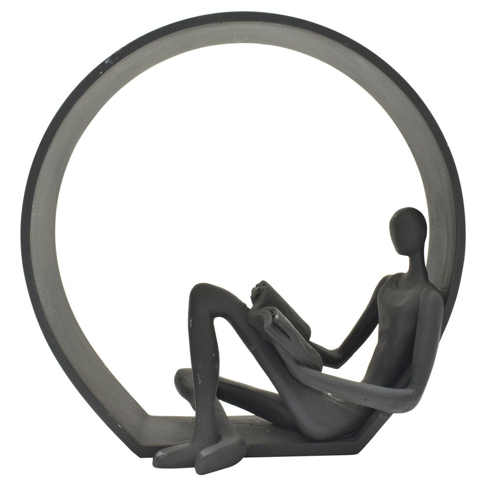 7" Black Resin Man Tabletop Sculpture on a white background