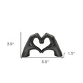 4" Black Resin Heart Hands Tabletop Sculpture. Sculpture isolated on a plain white background, finished in black resin.