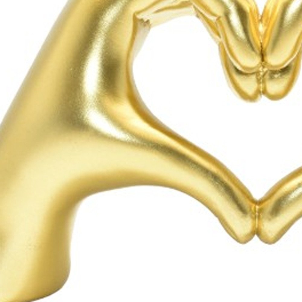 4" Gold Resin Heart Hands Tabletop Sculpture. Sculpture in gold resin.