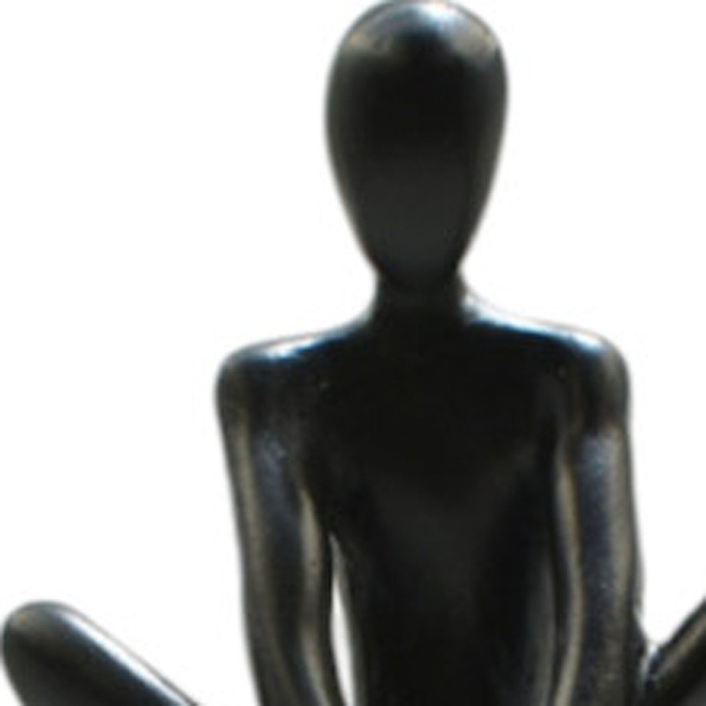 8" Black Resin People Tabletop Sculpture on a white background