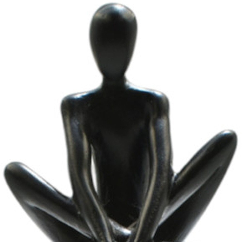 8" Black Resin People Tabletop Sculpture on a white background