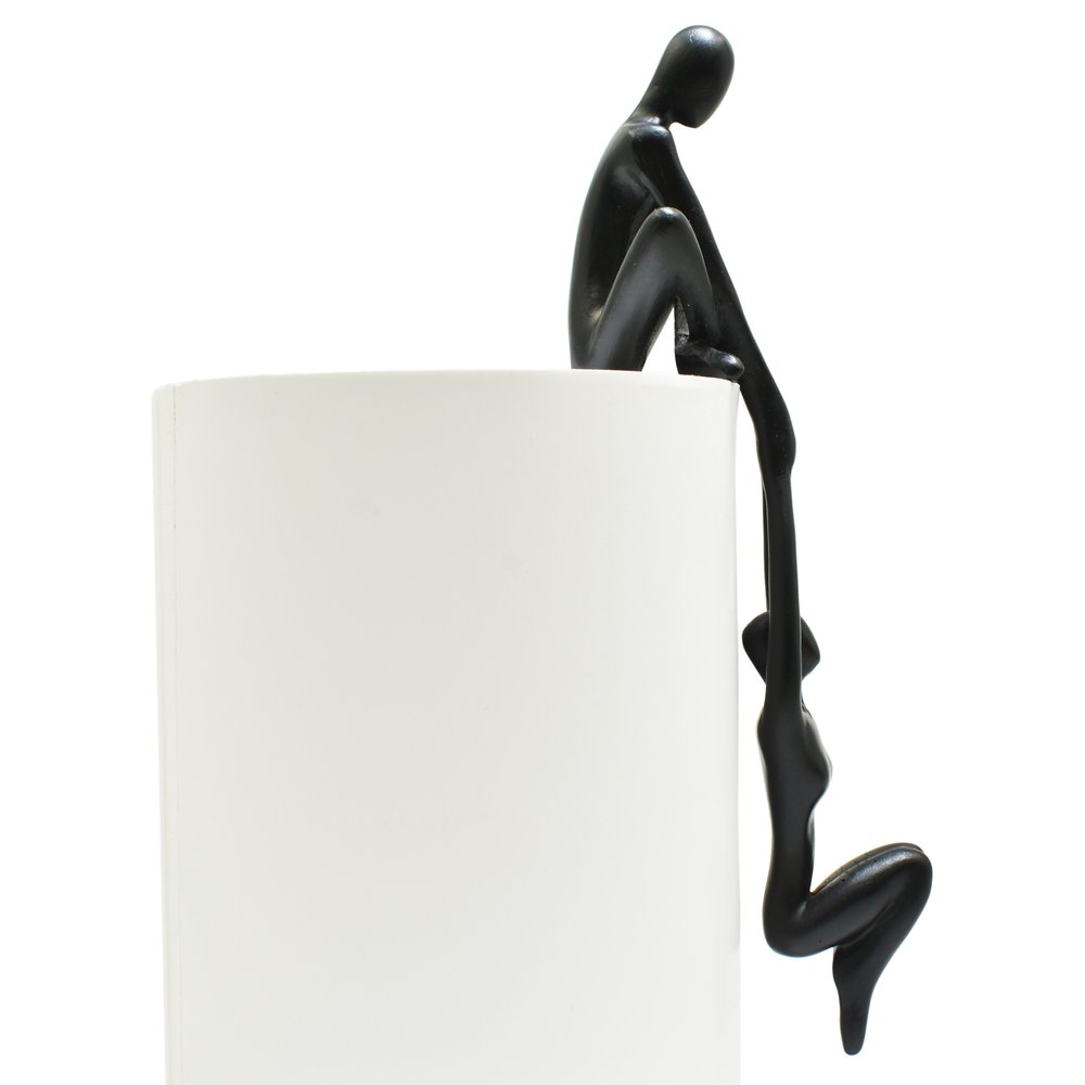 8" Black Resin People Tabletop Sculpture on a white background