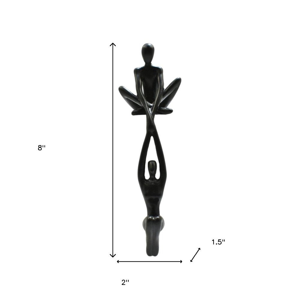 8" Black Resin People Tabletop Sculpture on a white background