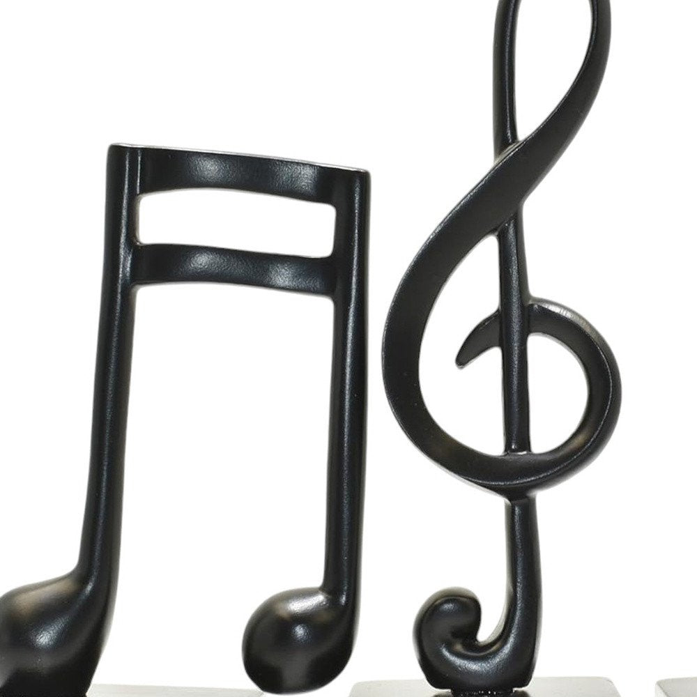 Set of Three Black Resin Music Tabletop Sculpture on a white background