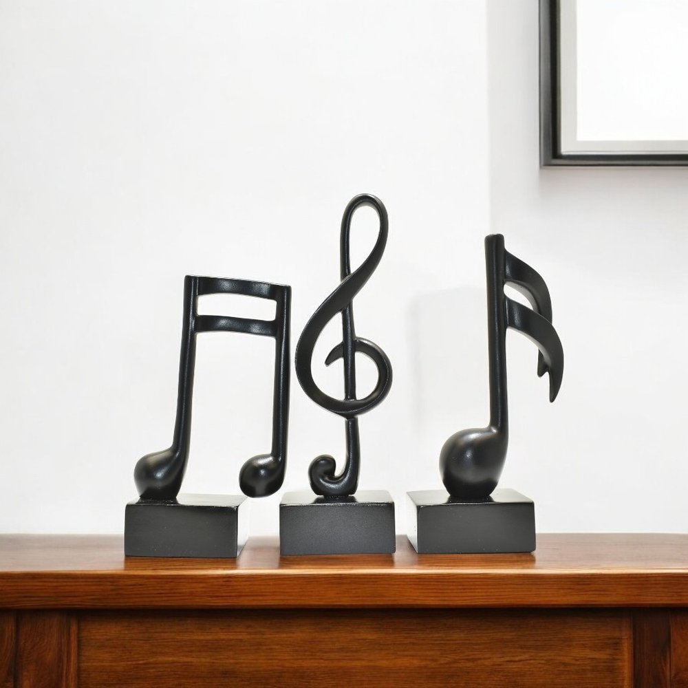 Set of Three Black Resin Music Tabletop Sculpture on a white background