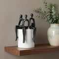 Set of Three Black Resin People Tabletop Sculpture