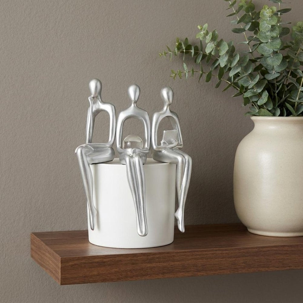 Set of Three Silver Resin People Tabletop Sculpture