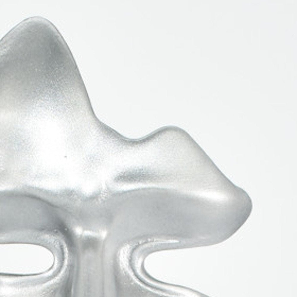6" Silver Resin Tabletop Sculpture. Sculpture isolated on a plain white background, finished in silver resin.