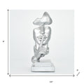 6" Silver Resin Tabletop Sculpture. Sculpture isolated on a plain white background, showing a silver resin surface.