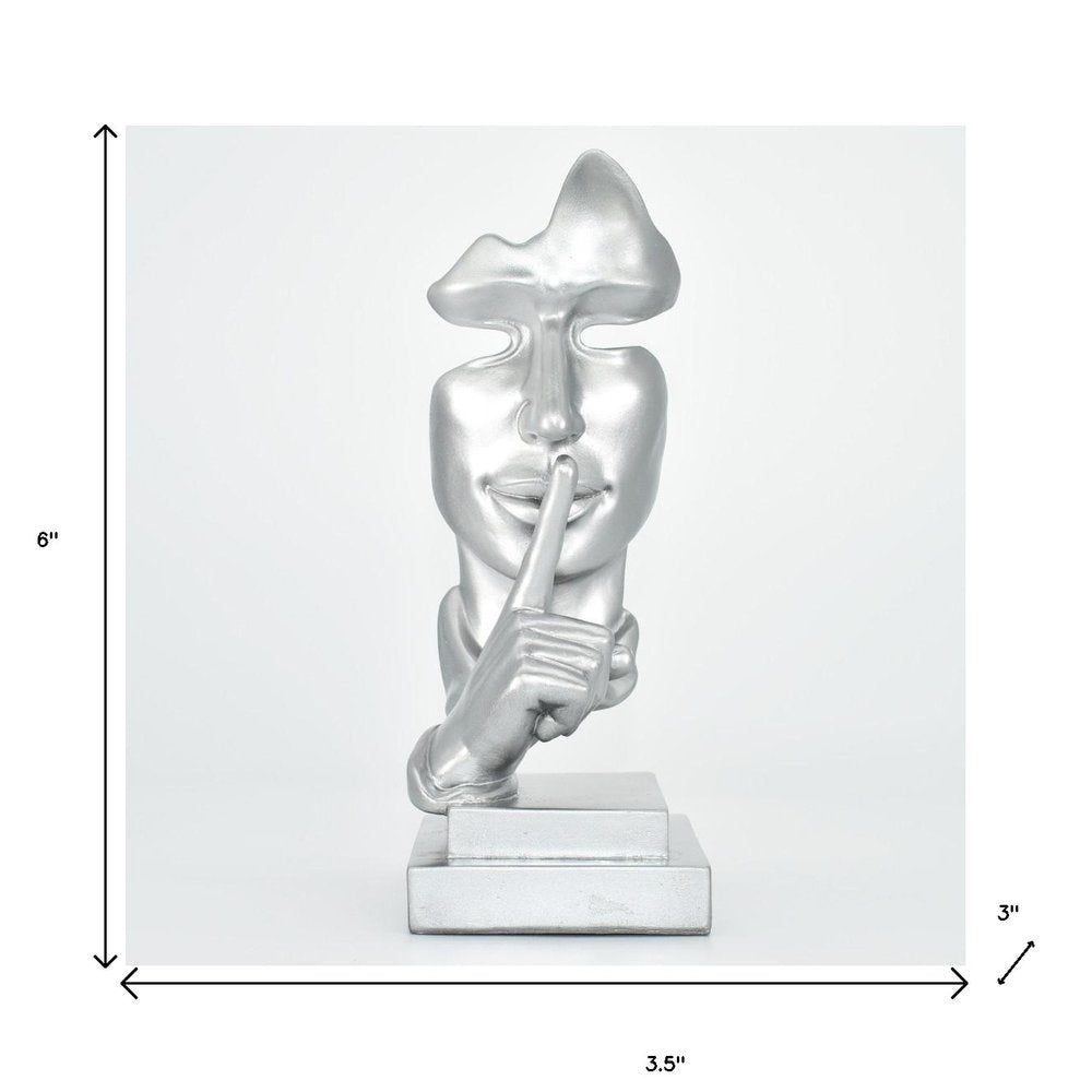 6" Silver Resin Tabletop Sculpture. Sculpture isolated on a plain white background, showing a silver resin surface.