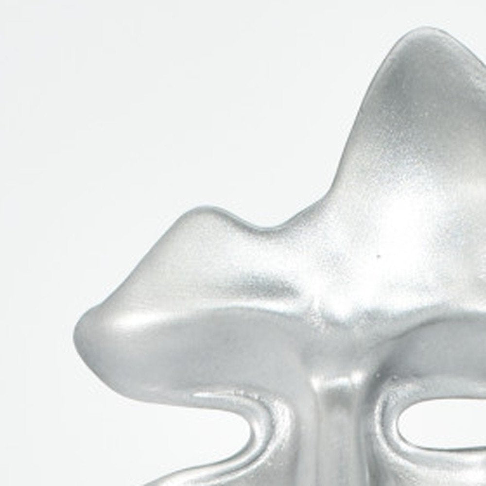 6" Silver Resin Tabletop Sculpture. Sculpture isolated on a plain white background, in a silver resin finish.