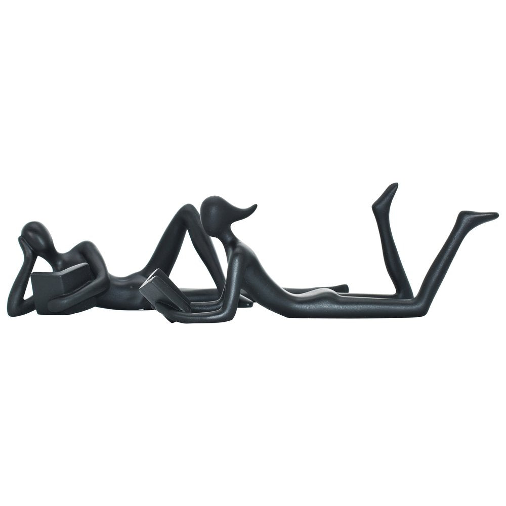 Set of Two Black Resin People Tabletop Sculpture on a white background