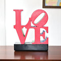4" Red Blue Green And Black Resin Love Tabletop Sculpture