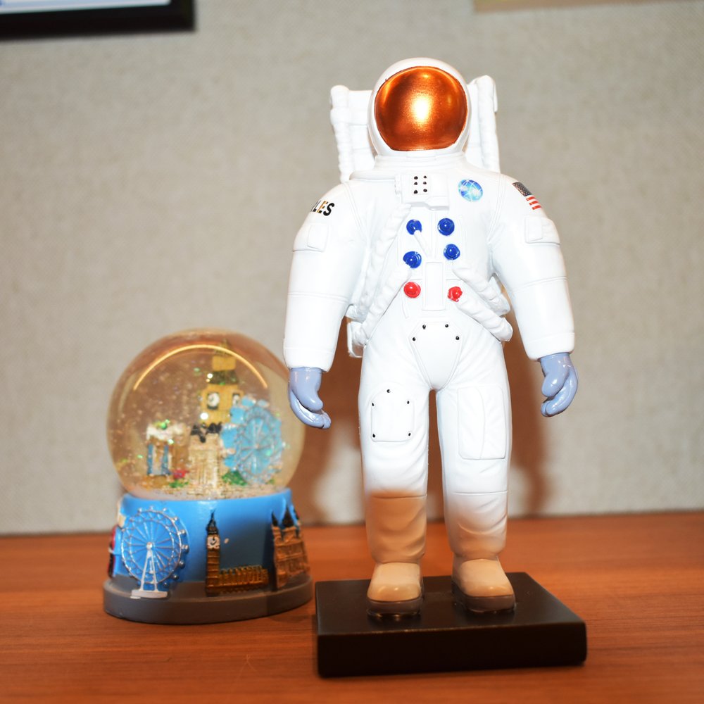 6" White Resin USA Astronaut Tabletop Sculpture. Sculpture in white resin.