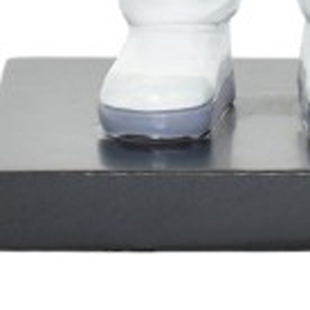 6" White Resin USA Astronaut Tabletop Sculpture. Sculpture isolated on a plain white background, finished in white resin.