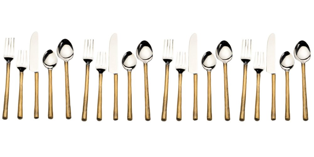 Matte Gold Stainless Steel Twenty Piece Hand Forged Flatware Set on a white background