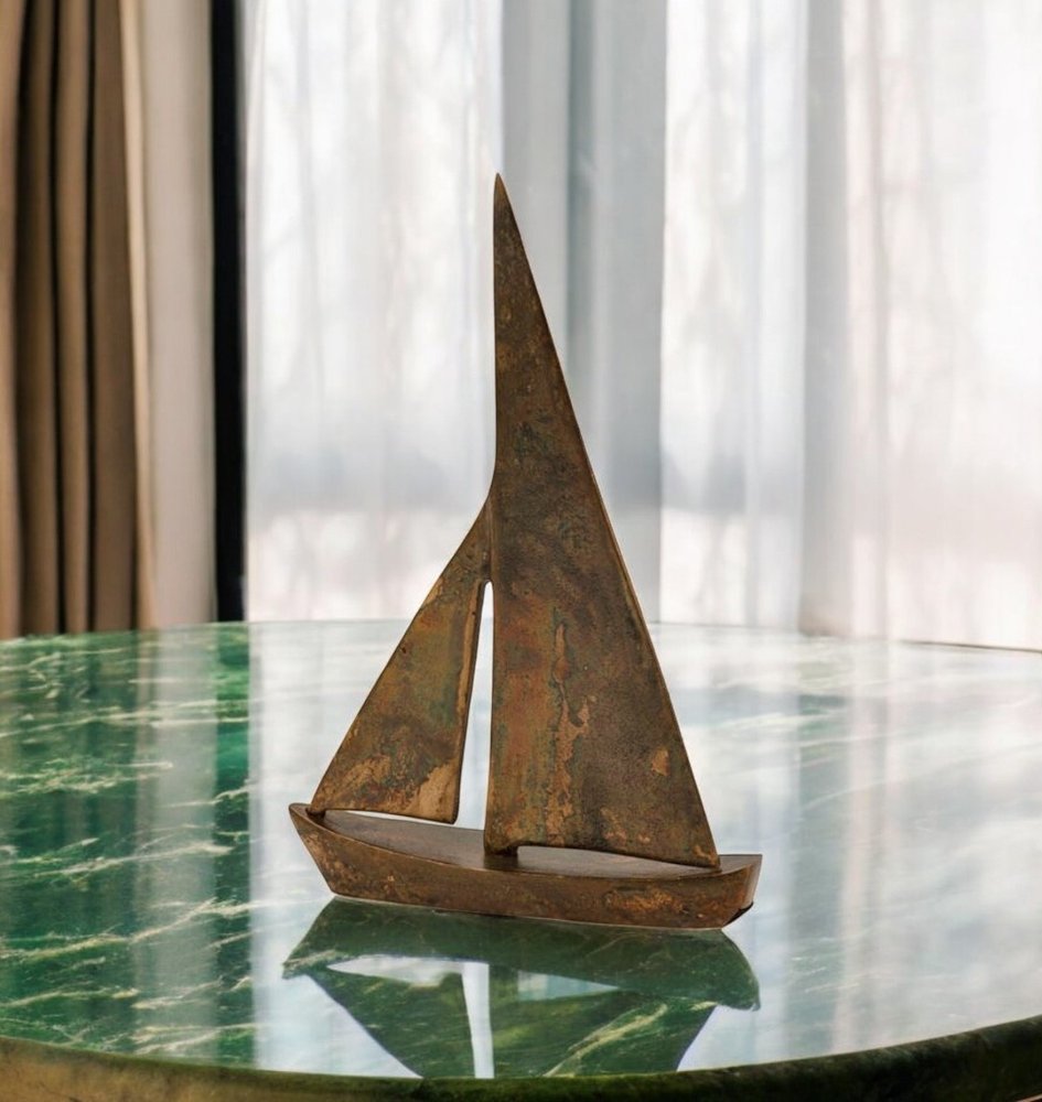 12" Rust Aluminum Decorative Sailboat Tabletop Sculpture detail shot of the dark brown metal finish.