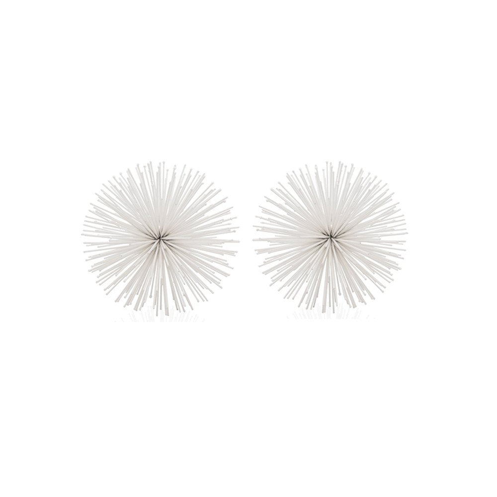 Two white spiky sphere tabletop sculptures made of iron on a white background.