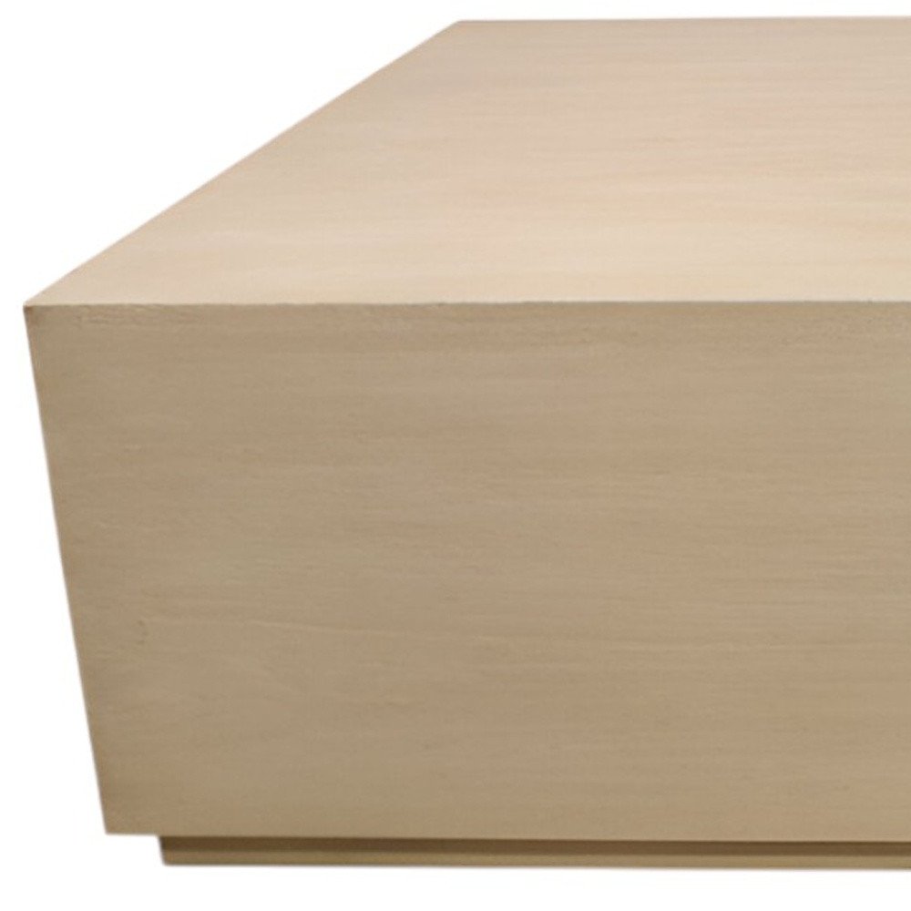 66" Natural Solid Wood Distressed Coffee Table. Coffee table isolated on a plain white background, showing a tan wood surface.