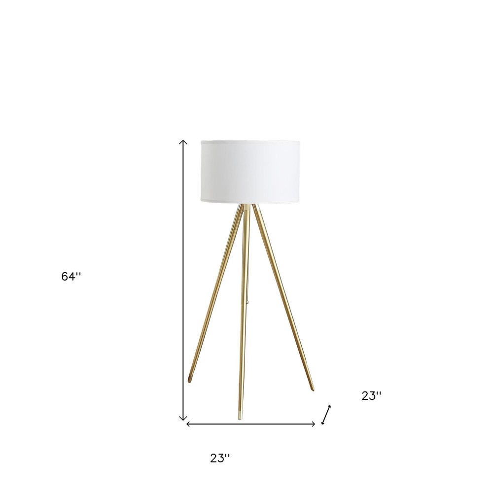 Gold Metal Adjustable Tripod Floor Lamp With White Linen Drum Shade on a white background