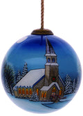Snowy Church Christmas Hand Painted Blue And White Glass Ball Ornament on a white background
