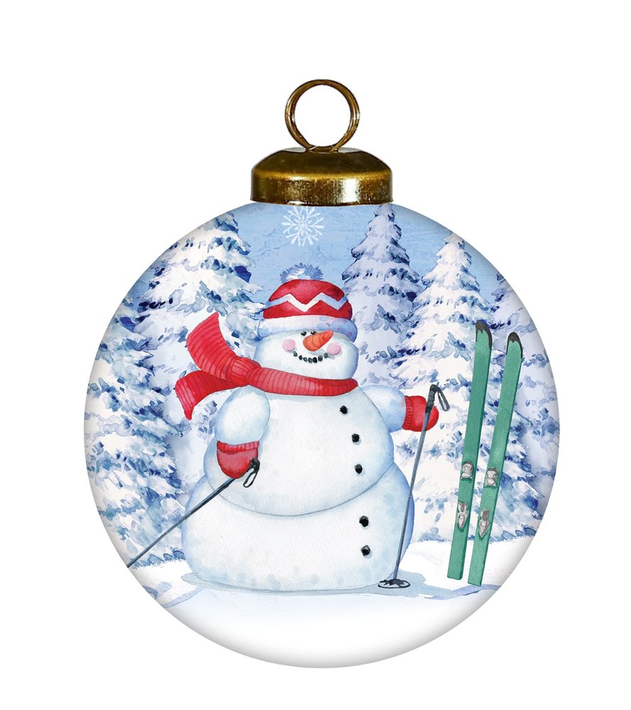 Hand-painted glass ball ornament featuring a snowman with red scarf and hat, skis, and a snowy forest background.
