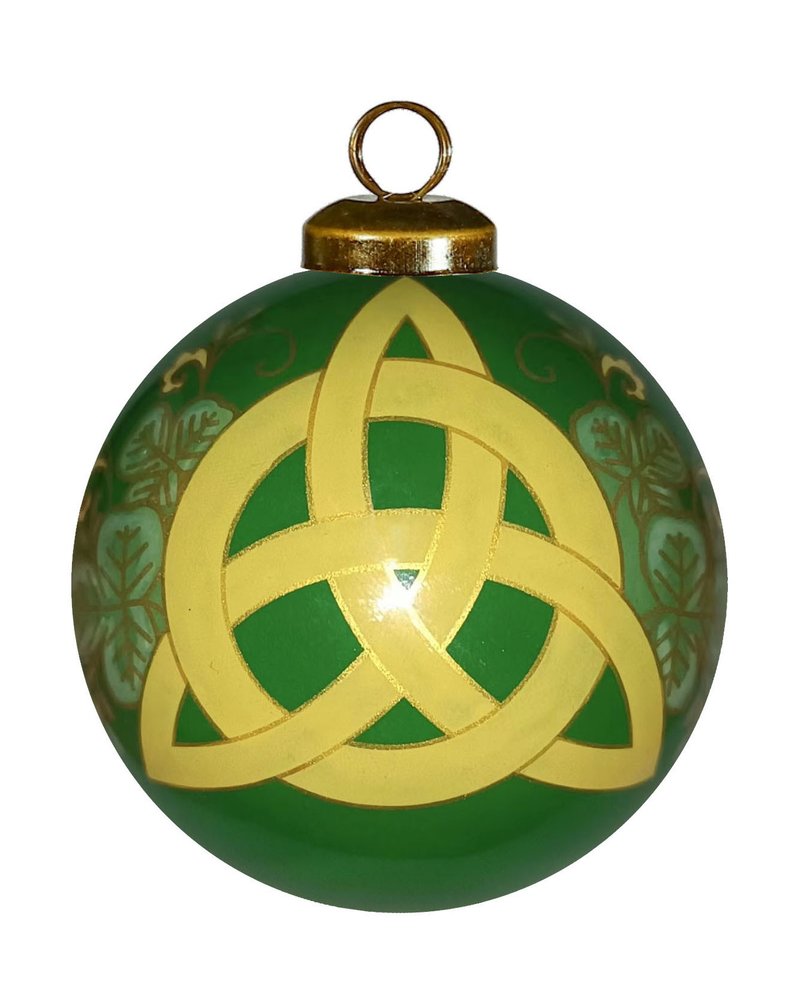 Green glass Christmas ornament with a yellow Trinity knot design and gold accents on a white background.
