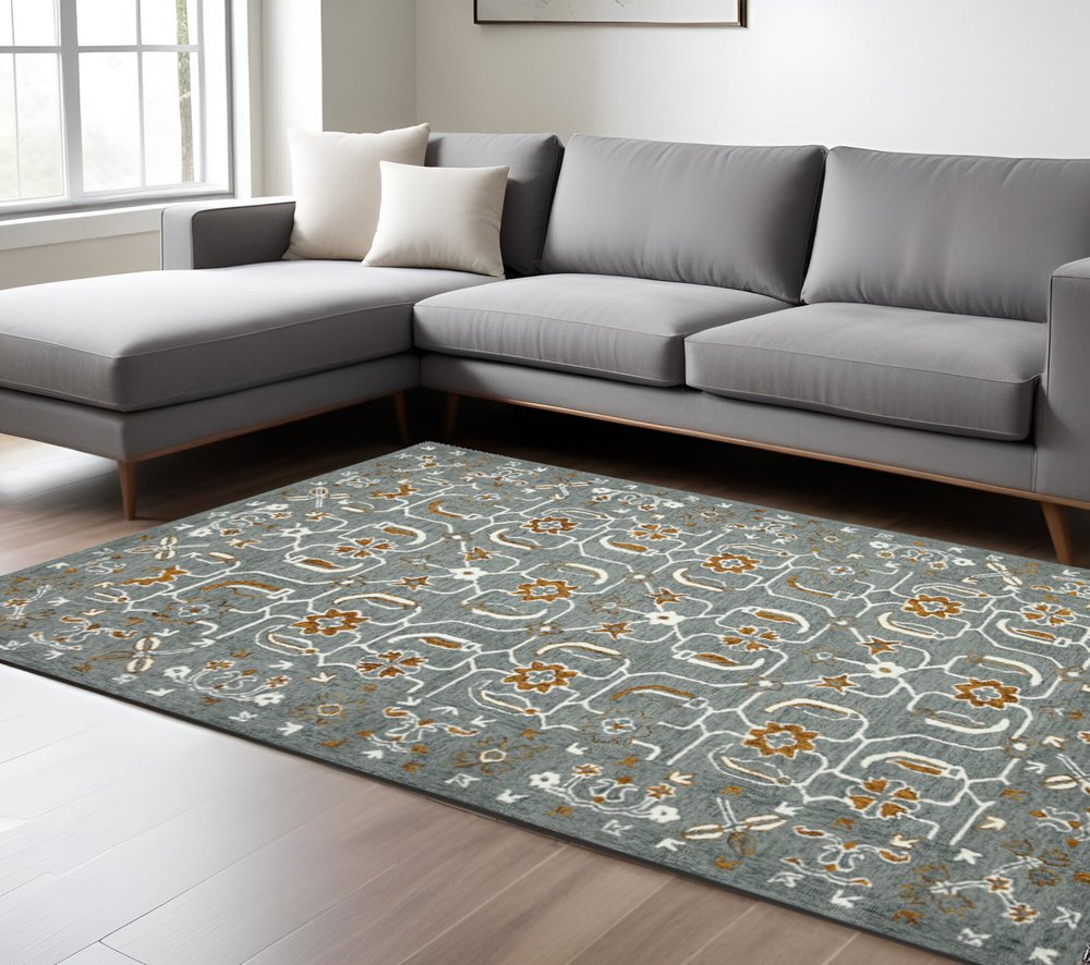 9' X 13' Orange Gray And Ivory Wool Floral Medallion Hand Hooked Area Rug close-up detail
